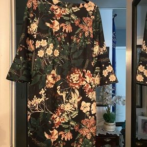 Brand new jumpsuits and dresses .